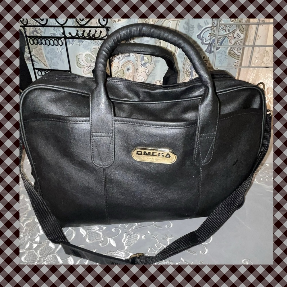 Omega Leather Duffel Bag